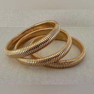 3 Gold-tone stretch “Snake Chain” bangles